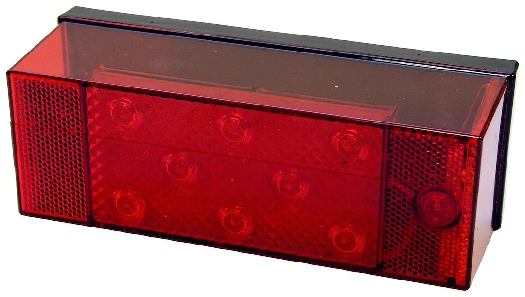 V856 – PETERSON MFG Trailer Light, Stop/ Turn/ Tail Light LED Rectangular Red Lens 7.94 Inch x 2.88 Inch With Carriag...